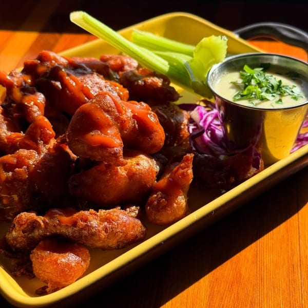 Moonstone Bar & Grill's boneless wings with buffalo sauce, celery sticks, and a side of ranch dressing.