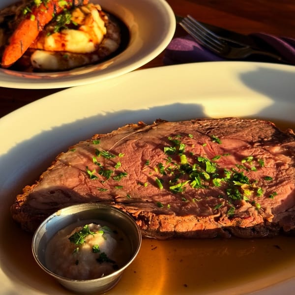 Moonstone Bar & Grill's prime rib with gravy and horseradish, with a side of mashed potatoes.